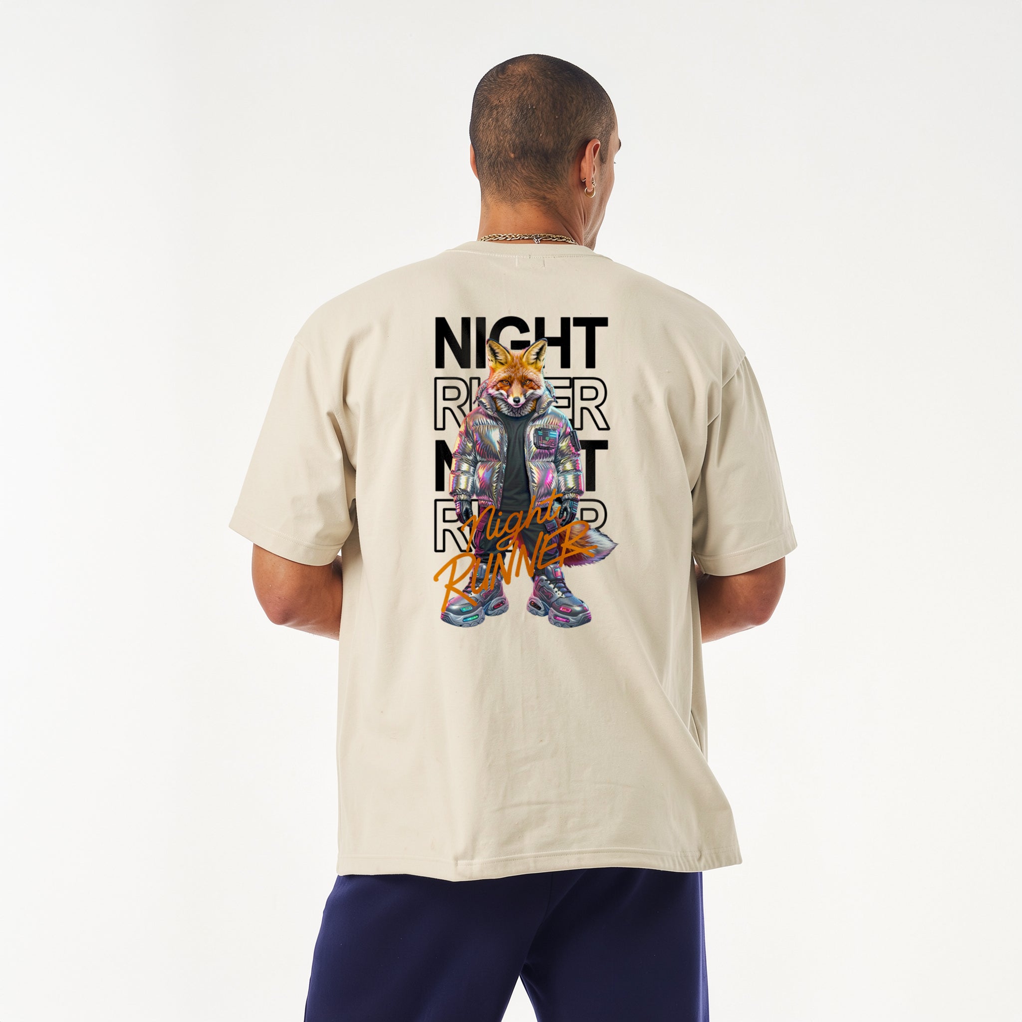 Oversized graphic streetwear t-shirt featuring a humanoid cyberpunk fox wearing an iridescent metallic puffer jacket and neon chunky sneakers, with the text Night Runner.